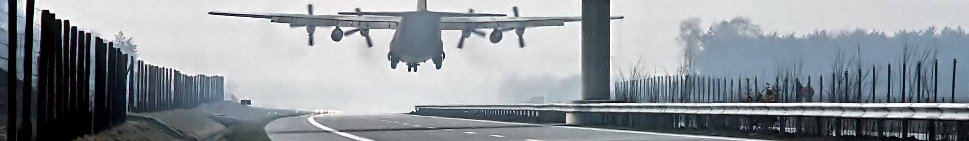 Plane landing on motorway
